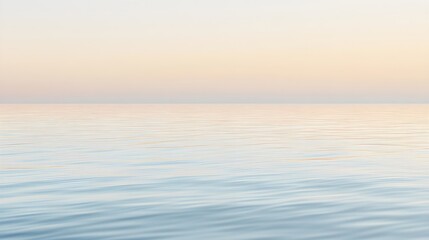 Obraz premium A serene water surface reflecting the soft hues of dawn, creating a tranquil atmosphere with ample copy space,No blurriness