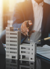 Real estate agent and customer signing contract to buy house, insurance or loan real estate.rent a...