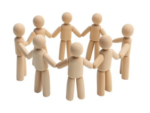 a group of wooden people holding hands