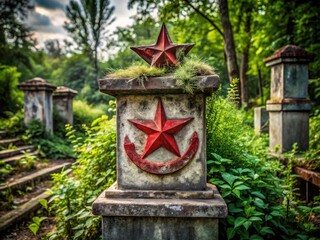 A faded, red-star-emblazoned hammer-and-sickle symbol stands atop a crumbling concrete pedestal, surrounded by overgrown weeds and rusting ironwork, exuding nostalgia for a bygone era.