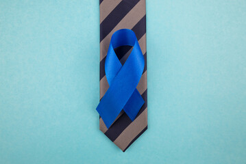 Empowering Men's Health. A bird's-eye view of prostate cancer awareness icon - blue ribbon,...