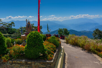 Beautiful view of Samdruptse Monastery with Himalayan mountains in the background. Samdruptse is a...