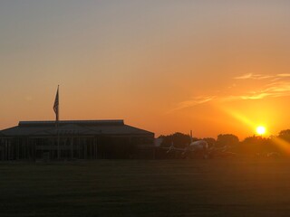 Naklejka premium No better view than Old Glory and a beautiful sunrise