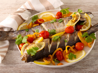 Seabass fish with pepper and tomato