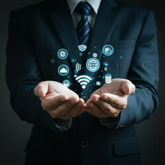 Man in Suit Holding Cloud Technology with Wi-Fi, Global Connectivity, and Communication Icons