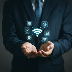 Man in Suit Holding Cloud Technology with Wi-Fi, Global Connectivity, and Communication Icons