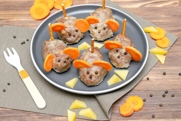Small meatball mouse, meatloaf mice with ears of carrot,cheese,creative fun food snack idea for kids party. Menu for spooky Halloween dessert treats, edible cute rat