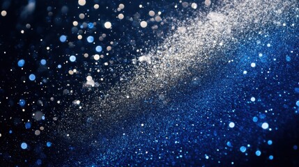 Obraz premium Scattered gradient beige to cobalt blue particles against a dark backdrop create a neutral yet vibrant celebratory background