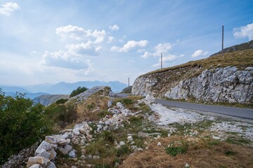 Fototapeta premium Mountain road winding through rocky terrain. Durmitor National Park. Montenegro