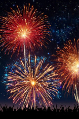Obraz premium Vibrant Fireworks Display with Radiant Bursts of Red, Blue, and Gold Streaks Against Night Sky – Dazzling Explosions and Intricate Patterns Evoking Awe, Wonder, and Celebration Magic