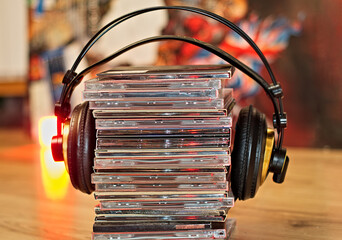 Stack of music CD's with headphones