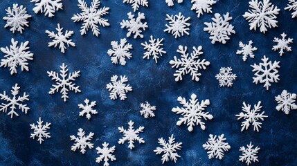 white snowflakes on dark blue background