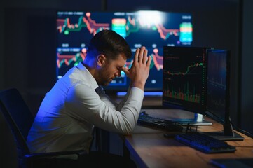 Stressed business man crypto trader broker investor analyzing stock exchange market crypto trading