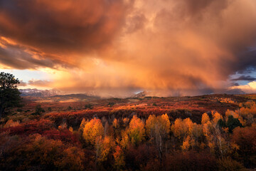 Sunrise and scenic autumn landscape with fall foliage in Colorado