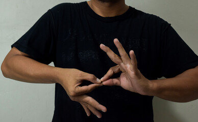 young man using sign language interpreter to communicate