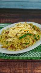 chinese noodles with egg omelet and vegetables, chifa, peruvian food