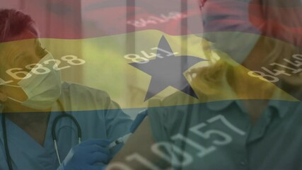 Animation of flag of ghana and numbers processing over caucasian male doctor vaccinating woman - Powered by Adobe