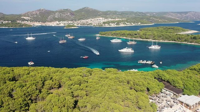 Drone Aerial View of Tri Grede Bay and Zdrilca Cove on Pakleni Otoci, Party Club