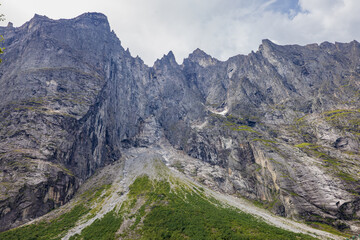 The Troll Wall (Trollveggen) is part of the mountain massif Troll Peaks (Trolltindene) in the Romsdalen valley in Rauma Municipality in Møre og Romsdal county, Norway. It is the tallest vertical rock 