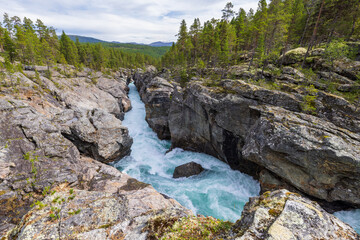 Ridderspranget (The Knight’s leap) is a narrow gorge through Sjodalen in the river Sjoa, Norway