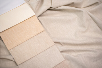 Fabric in milk, beige and gray colors for home textiles and curtains.