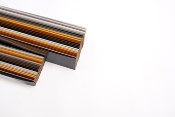 Samples of wooden blinds for windows in a store.