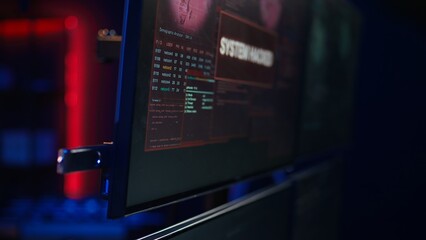Hacker doing illegal activities in secret underground base, uploading USB flash drive containing...