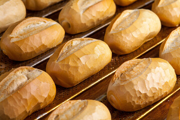 A TRAY OF FRESHLY BAKED FRENCH BREAD