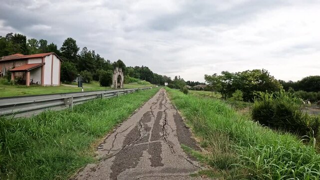 Via Francigena - bicycle path along a country road leaving  La Carnevala, municipality of Medesano, Province of Parma, Emilia-Romagna, Italy