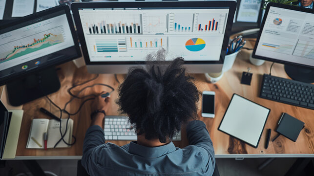 Data Analyst Working on Multiple Computers