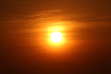 Golden Dusk Beneath a Cloudy Sky