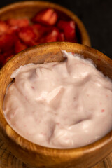 Fototapeta premium fresh natural yogurt with added strawberry flavor with berries