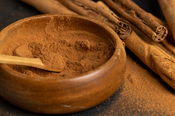 cinnamon tree bark with golden powder