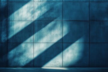 Fototapeta premium Dark blue sunlit tiled wall with shadows from the window. Abstract trendy grunge background.