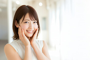 笑顔が輝くアジア人女性（美容イメージ）