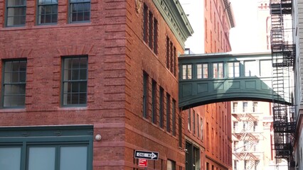 New York City Staple street skybridge. Vintage retro industrial architecture, red brick building....
