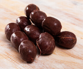Pile of delicious blood sausages on wooden background