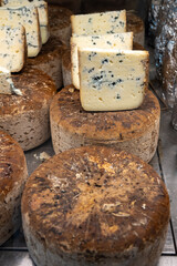 Pieces of tasty Blue Basque Fume smoked sheep cheese produced in south-western France, Northern Basque Country