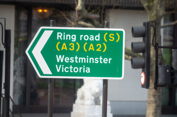 Obraz premium Transportation in London city, roads, road signes, street signes, warnings, indicating of directions in Great Britain, city life in England