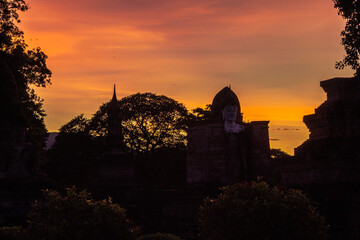 Fototapeta premium Background atmosphere inside the important historical tourist attraction Sukhothai Historical Park,foreign tourists from all over the world like to bring their children study history during holiday.