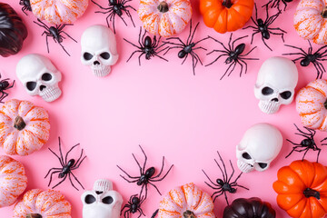 Pink Halloween framed border background backdrop. Trick or treat party styled with white skull, pumpkins, black spiders.