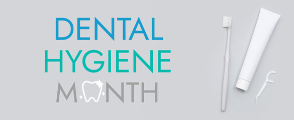 Toothpaste with toothbrush and floss toothpick on grey background