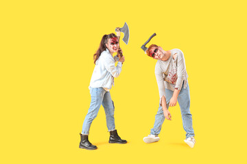 Scary zombies with axes on yellow background