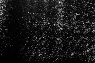 Texture of paper with black ink as background, top view