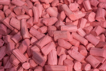 Stick candy close-up shot. Pink sweet close-up. 