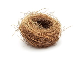 Obraz premium A small, brown, woven bird's nest, isolated on a white background.