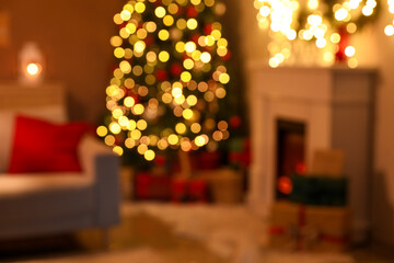 Interior of cozy living room with sofa, fireplace and gift boxes near Christmas tree at night,...