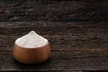 Baking soda powder in the bowl - Healthy food.