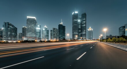 Fototapeta premium Night cityscape with a highway and tall buildings (press enter key here as a separator for title and keywords)
