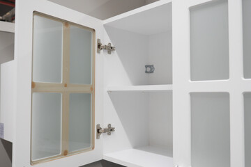 Contemporary and Sleek Modern White Kitchen Cabinet Featuring Stylish Glass Doors for Elegance